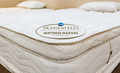 Skaneateles mattress with brand logo on a wooden floor
